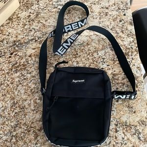 Supreme shoulder bag. 3 of the letters on the strap marked out (see 2nd pic)